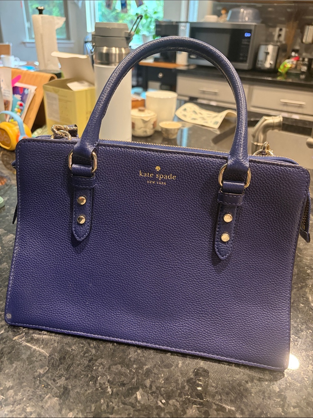 kate spade New York pebbled navy blue satchel with gold hardware